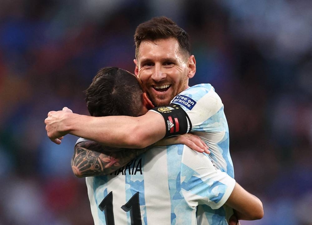 Argentina’s Angel Di Maria celebrates scoring their second goal with Lionel Messi after beating Italy to win the Finalissima at Wembley Stadium, London, June 1, 2022. — Reuters pic