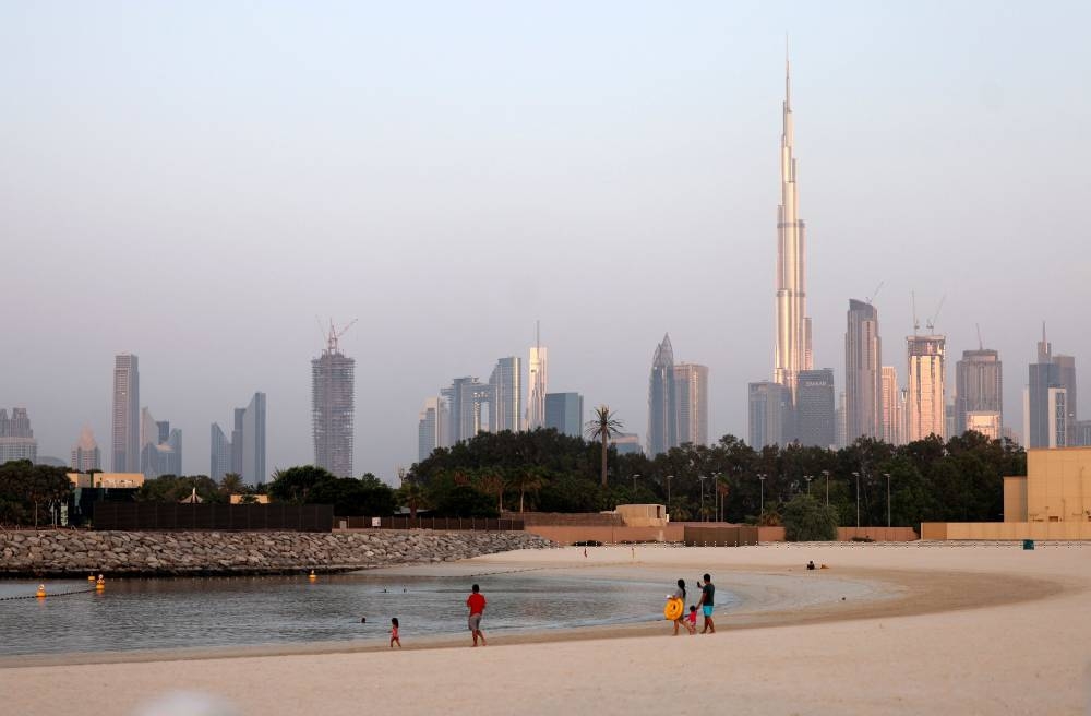 People gather at a beach in the Gulf emirate of Dubai, on September 15, 2022. The United Arab Emirates did not qualify for the Qatar World Cup but it will be a winner anyway if an overspill of fans floods its hotels, restaurants and planes. Dubai is gearing up with fan zones announced at parks, beaches and in the financial centre, and hotels offering special packages. — AFP pic