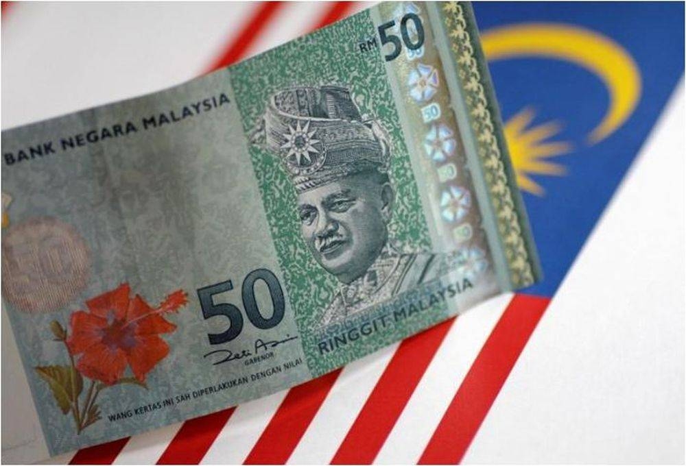 During the week, Finance Minister Datuk Seri Tengku Zafrul Tengku Abdul Aziz, in his social media postings, said that Malaysia is not experiencing an economic crisis just because the ringgit is trading at a low level against the US dollar. — Reuters pic