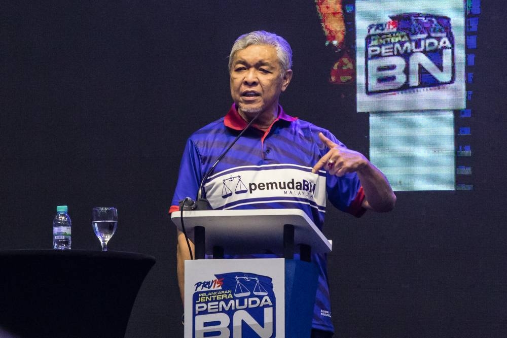 Barisan Nasional Chairman Datuk Seri Dr Ahmad Zahid Hamidi speaks during the launch of Barisan Nasional Youth machinery at Titiwangsa Stadium in Kuala Lumpur on September 17, 2022.— Picture by Firdaus Latif