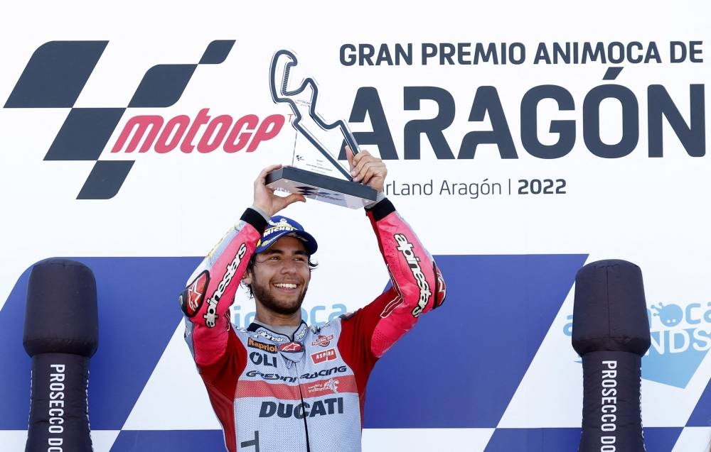 2022 Gresini Racing MotoGP's Enea Bastianini celebrates with the trophy on the podium after winning the Aragon Grand Prix at MotorLand Aragon, Alcaniz, Spain  September 18. — Reuters pic
