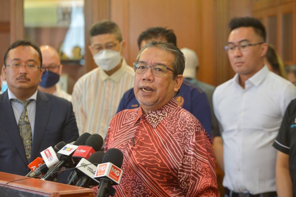 Minister in the Prime Ministers Department (Special Functions) Datuk Abdul Latiff Ahmad speaks to reporters in Putrajaya September 20, 2022. ― Picture by Shafwan Zaidon