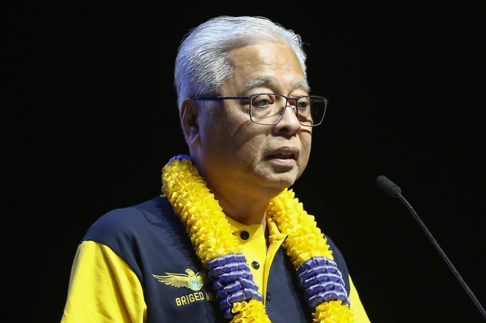 Prime Minister Datuk Seri Ismail Sabri Yaakob speaks during the launch of the National MIC Brigade at the Axiata Arena in Bukit Jalil September 18, 2022. — Picture by Yusof Mat Isa