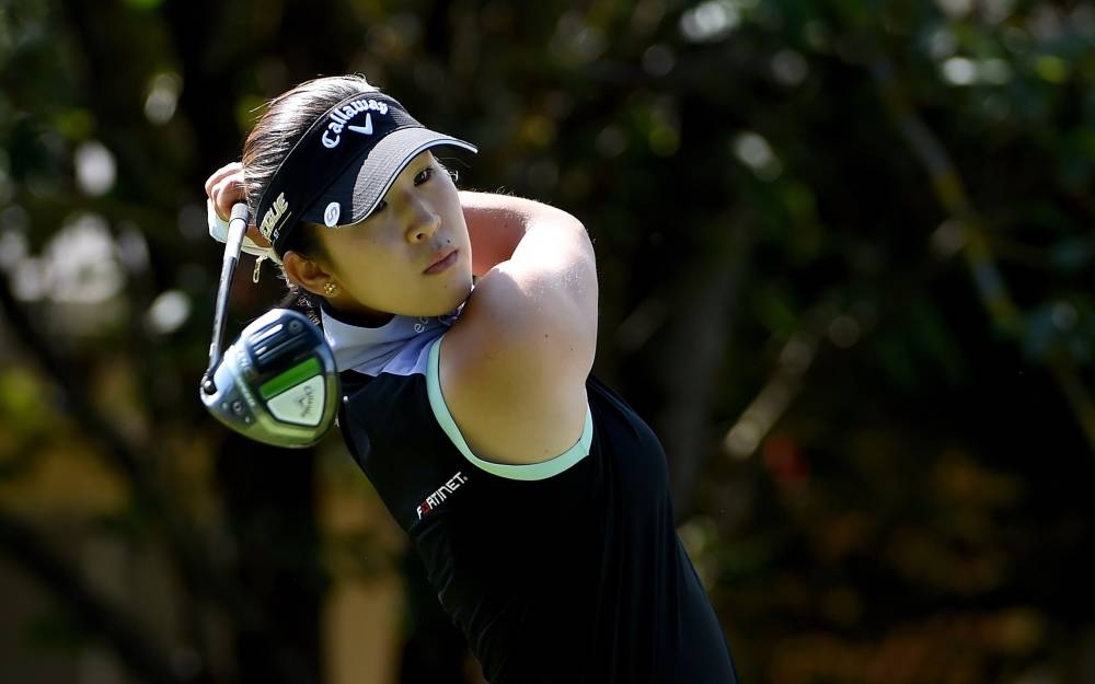 Andrea Lee hits her tee shot on the seventh hole during the final round of the Portland Classic at the Columbia Edgewater Country Club in Portland September 18, 2022. — AFP pic