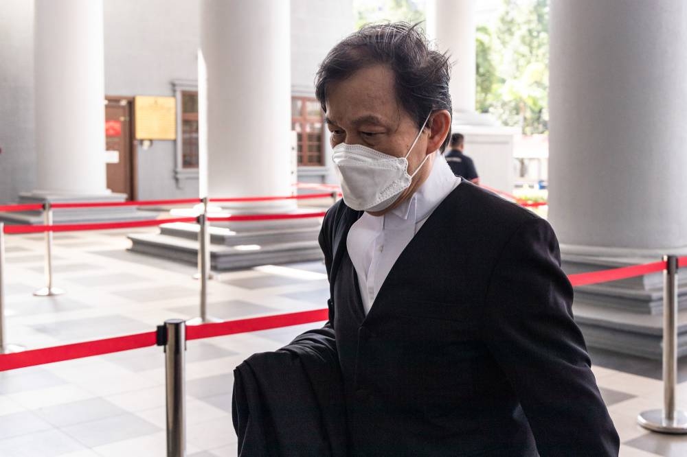 Lawyer Hisyam Teh Poh Teik arrives at the Kuala Lumpur Court Complex on September 21, 2022. — Picture by Firdaus Latif