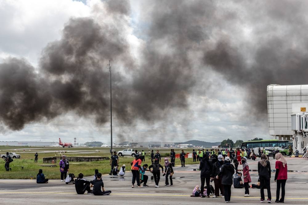 A appearance of a apish air blast convenance all through an airport emergency exercise at Kuala Lumpur International Airport (KLIA), September 22, 2022. — Picture by Firdaus Latif