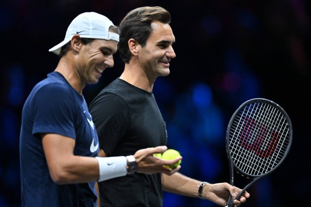 Switzerland’s Roger Federer and Spain’s Rafael Nadal attend a practice session ahead of the 2022 Laver Cup at the O2 Arena in London, September 22, 2022. — AFP pic 