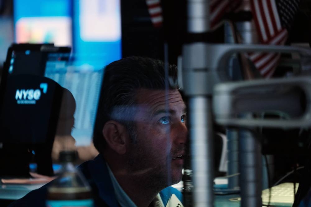 Traders work on the floor of the New York Stock Exchange on September 16, 2022. — Reuters pic