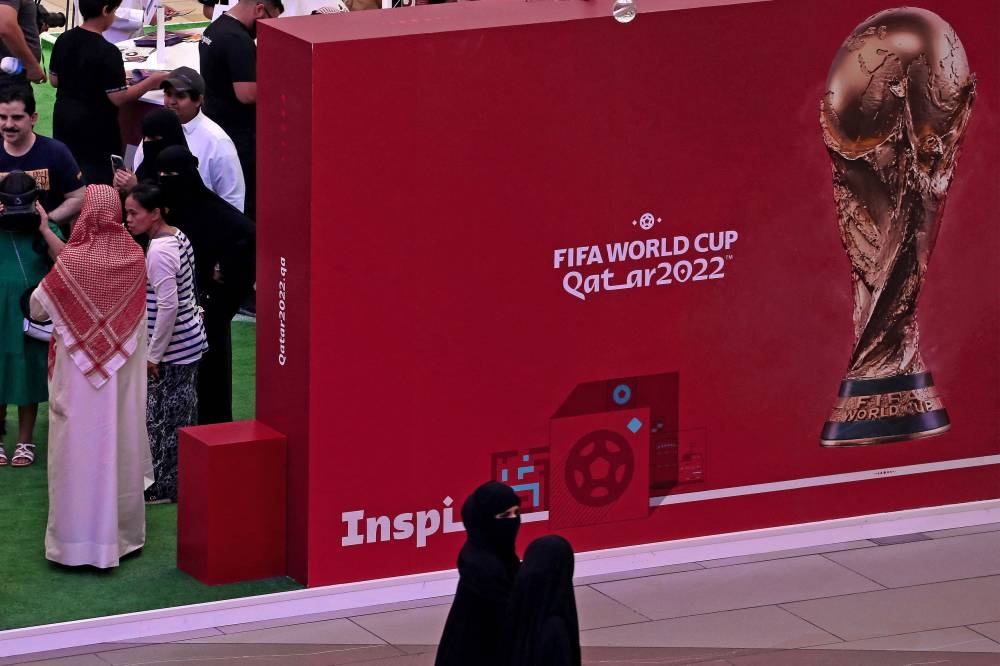 People visit a booth set up at the Avenues Mall in Kuwait City to promote this year's Fifa World Cup in Qatar September 22, 2022. — Reuters pic