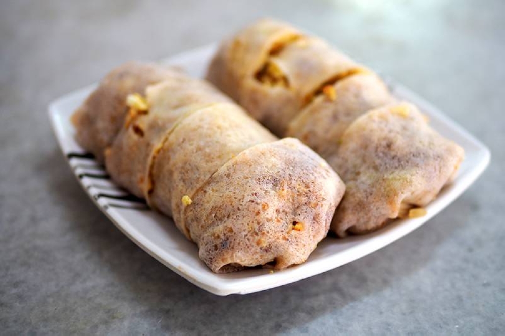 The coffeeshop has many eats like these 'popiah' generously stuffed with yam bean filling.