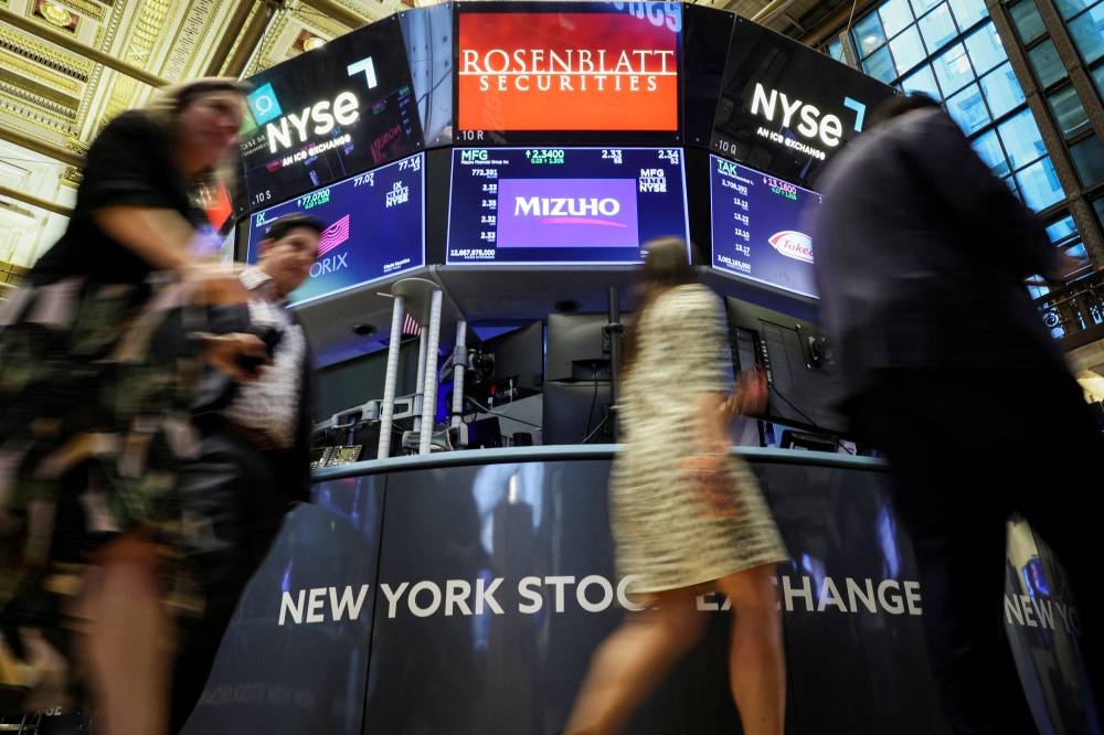 Guest walk on the floor of the New York Stock Exchange (NYSE) in New York City, US, September 22, 2022. —Reuters pic