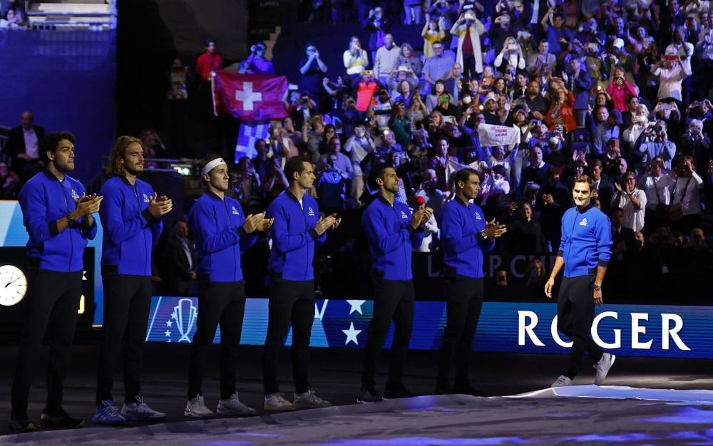 Team Europe members applaud as Roger Federer enters the stadium before the match between Team Europe’s Casper Ruud and Team World’s Jack Sock at the 02 Arena, London, Britain, September 23, 2022. — Action Images pic via Reuters