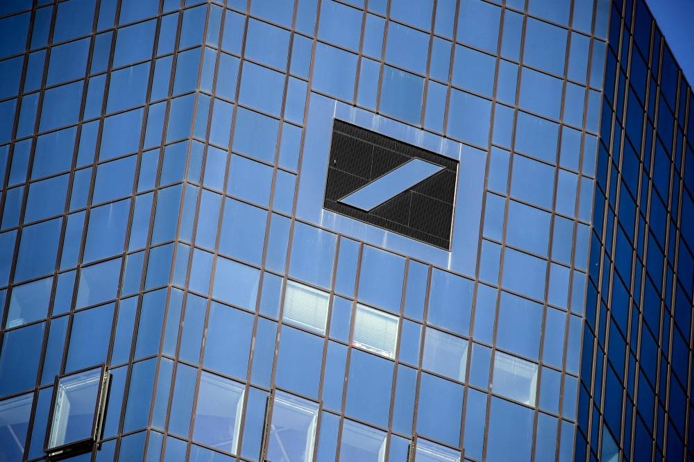 In this file photo taken on February 4, 2021 the logo of German giant Deutsche Bank is seen on their headquarters in Frankfurt. — AFP pic