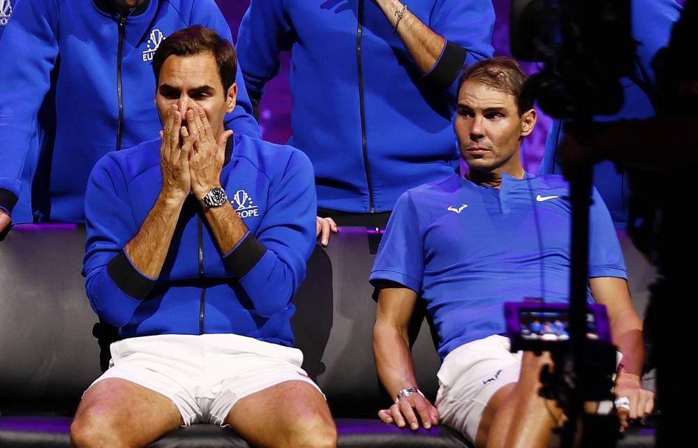 Team Europe’s Roger Federer with Rafael Nadal at the end of his last match after announcing his retirement at the 02 Arena in London, September 23, 2022. ― Reuters pic