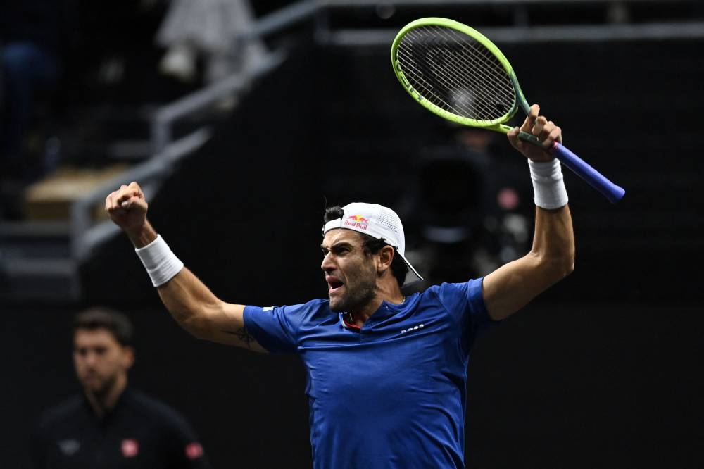 Italy’s Matteo Berrettini of Team Europe celebrates after his win over Canada’s Felix Auger-Aliassime of Team World in their 2022 Laver Cup men's singles tennis match at the O2 Arena in London on September 24, 2022. ― AFP pic