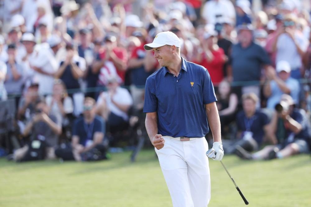 Jordan Spieth of the United States Team celebrates holing out on the 15th green to win the match 4&3 with teammate Justin Thomas on day three of the 2022 Presidents Cup on September 24, 2022 in Charlotte, North Carolina. — Warren Little/Getty Images/AFP pic