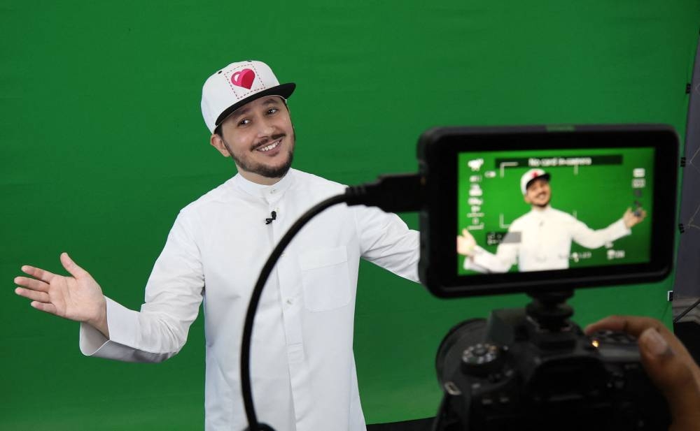 Qatari influencer Khalifa al-Haroon, knows as Mr.Q, is pictured in his studio in the capital Doha on September 11, 2022. — AFP pic