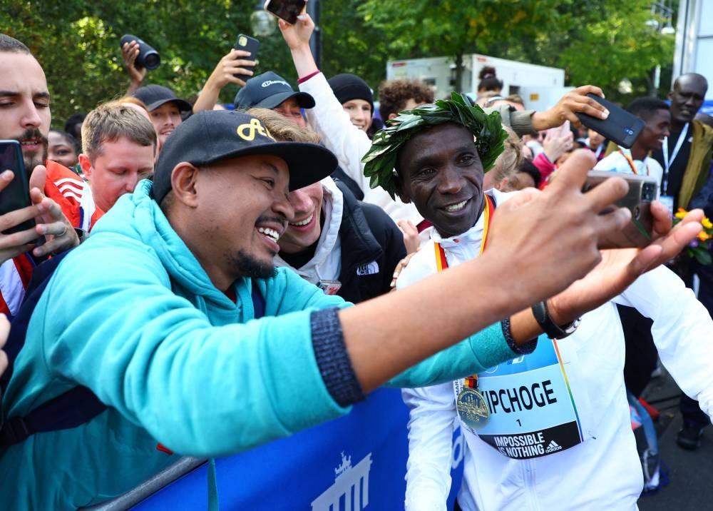 ‘One rabbit at a time’ says marathon magician Kipchoge after smashing ...