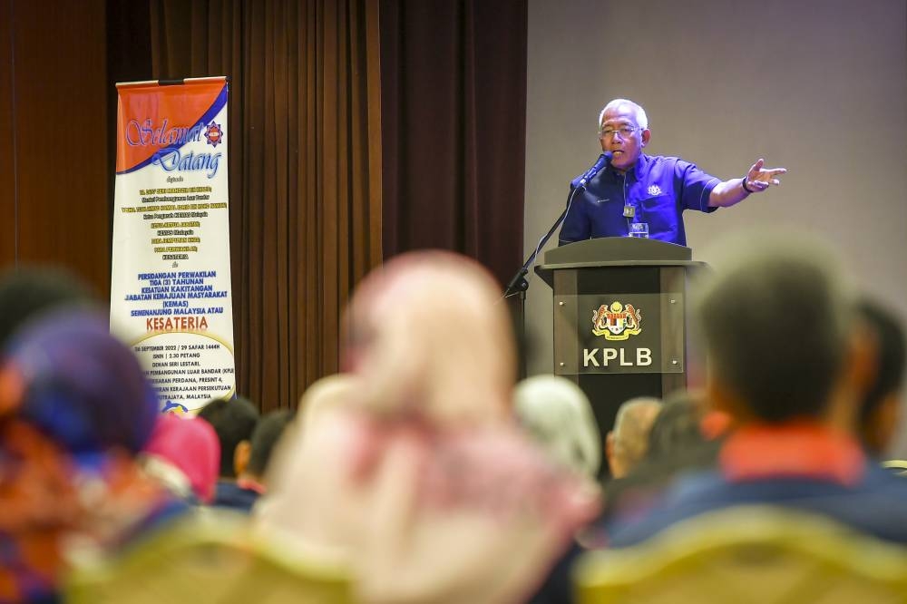 Rural Development Minister Datuk Seri Mahdzir Khalid speaks at the opening the second triennial delegates conference of the Peninsular Malaysia Kemas Staff Union (Kesateria) in Putrajaya September 26, 2022. — Bernama pic
