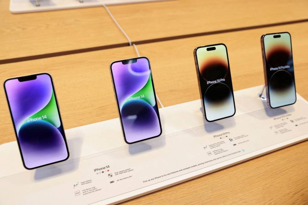 The iPhone 14, iPhone 14 Pro and iPhone 14 Pro Max are displayed at the Apple Fifth Avenue store, in Manhattan September 16, 2022. — Reuters pic