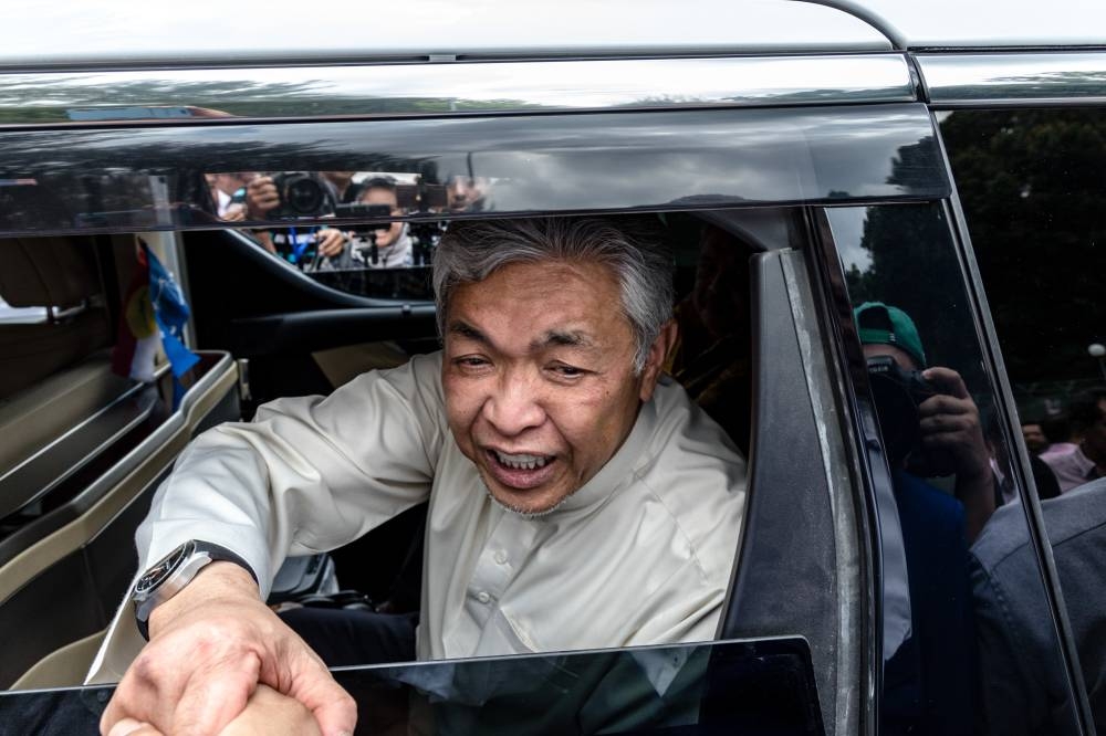 Zahid accused BN’s political foes of tarnishing the former prime minister’s reputation through character assassination. — Picture by Firdaus Latif