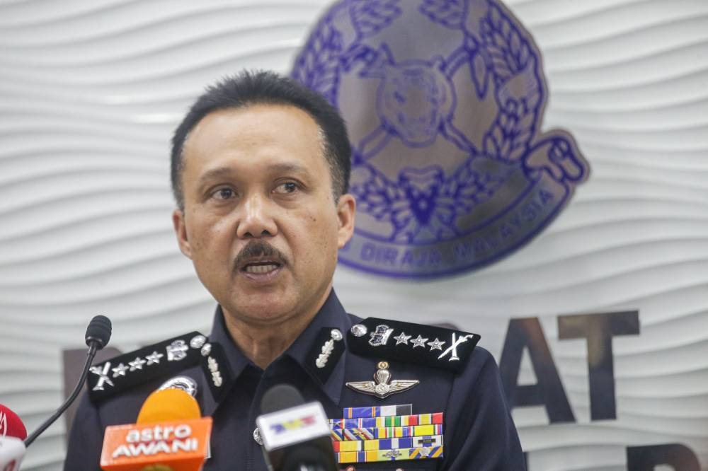Perak police chief Datuk Mohd Yusri Hassan Basri speaks to the press at the Perak police headquarters in Ipoh, September 27, 2022. — Picture by Farhan Najib
