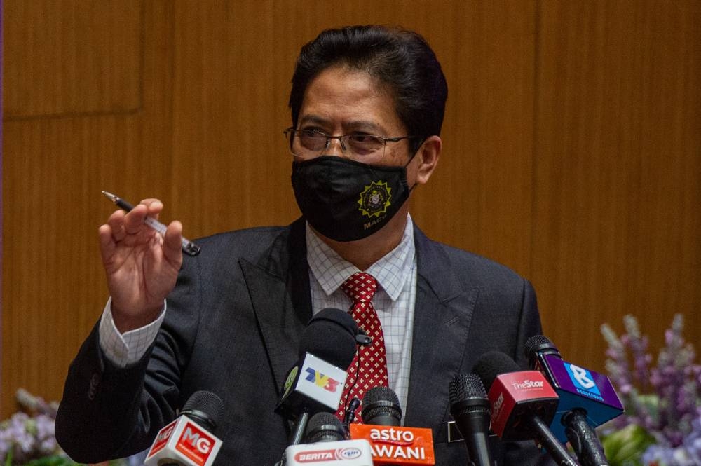 Tan Sri Azam Baki speaks to the media during a press conference at the MACC headquarters in Putrajaya, January 5, 2022. — Picture by Shafwan Zaidon