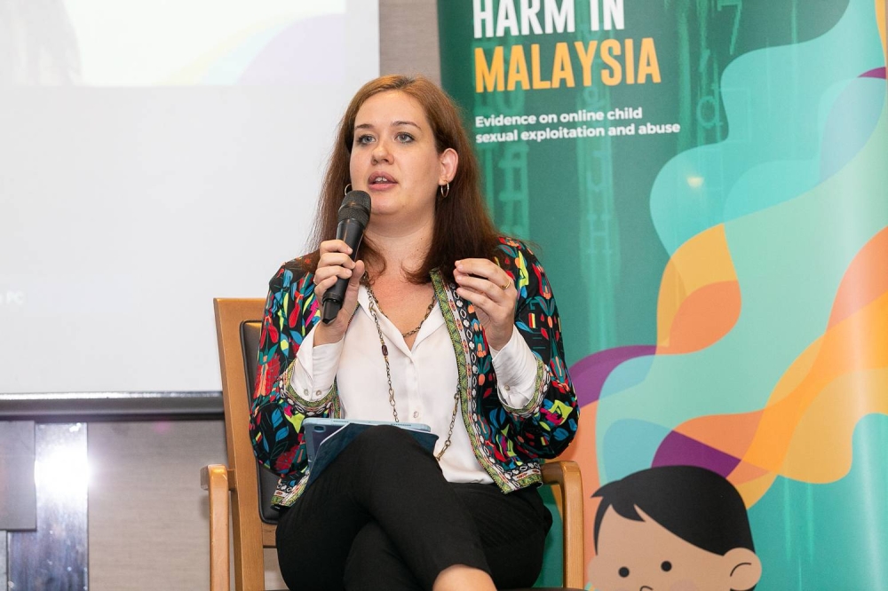 ECPAT legal research coordinator Andrea Varrella answering questions during a panel discussion on Child Online Sexual Exploitation and Abuse during Disrupting Harm media briefing at the Unicef Malaysia office at Wisma E&C in Kuala Lumpur, September 29, 2022. —Picture by Devan Manuel