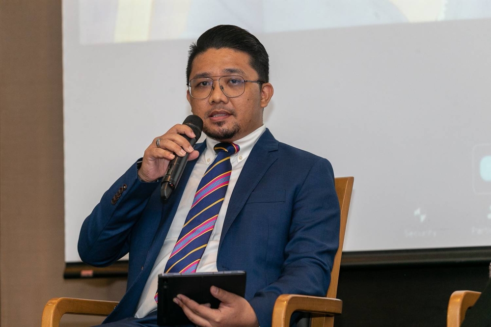 Malaysian Communications and Multimedia Commission’s New Media Department head Muhammad Amirul Hafiz Rosly speaks during a panel discussion on Child Online Sexual Exploitation and Abuse in Kuala Lumpur, September 29, 2022. —Picture by Devan Manuel