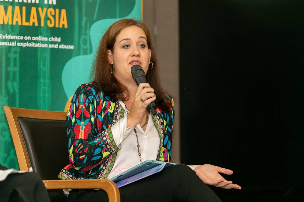 ECPAT legal research coordinator Andrea Varrella answering questions during a panel discussion on Child Online Sexual Exploitation and Abuse during Disrupting Harm media briefing at the Unicef Malaysia office at Wisma E&C in Kuala Lumpur, September 29, 2022. —Picture by Devan Manuel