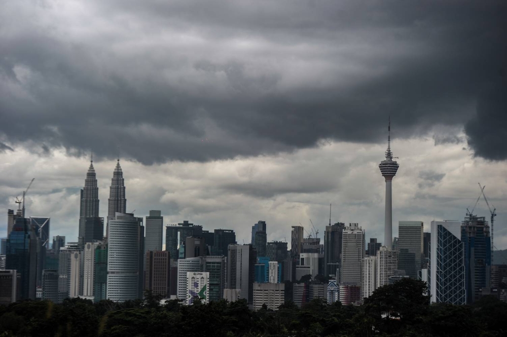 MetMalaysia said during the monsoon transition phase, the region will receive weak winds from various directions that are very conducive for thunderstorms, leading to short episodes of heavy rains and strong winds. — Picture by Shafwan Zaidon