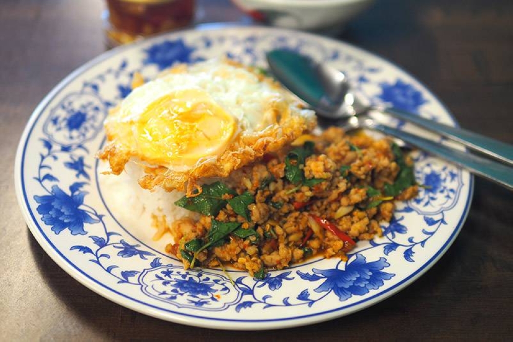 You can order various stir fried dishes with rice like this one with minced pork and served with fried egg.