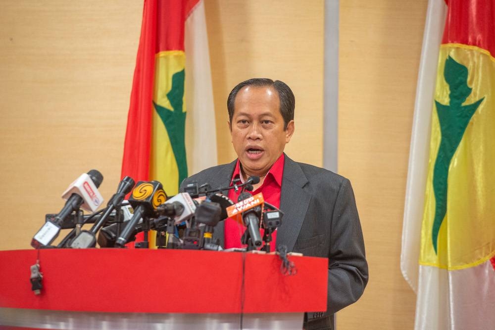 Umno secretary-general Datuk Seri Ahmad Maslan speaks at a press conference after the Umno supreme council meeting at Menara Onn, Kuala Lumpur, September 30, 2022. — Picture by Shafwan Zaidon