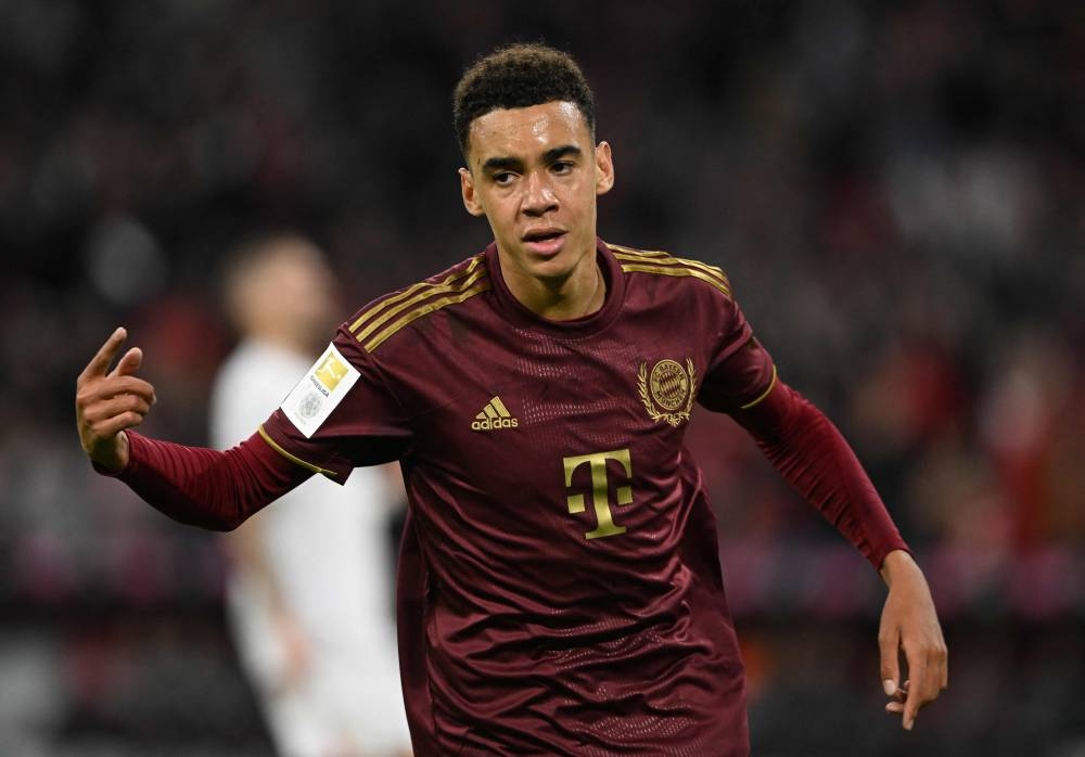 Bayern Munich's Jamal Musiala celebrates after scoring his team's second goal against Bayer Leverkusen September 30, 2022. ― AFP pic