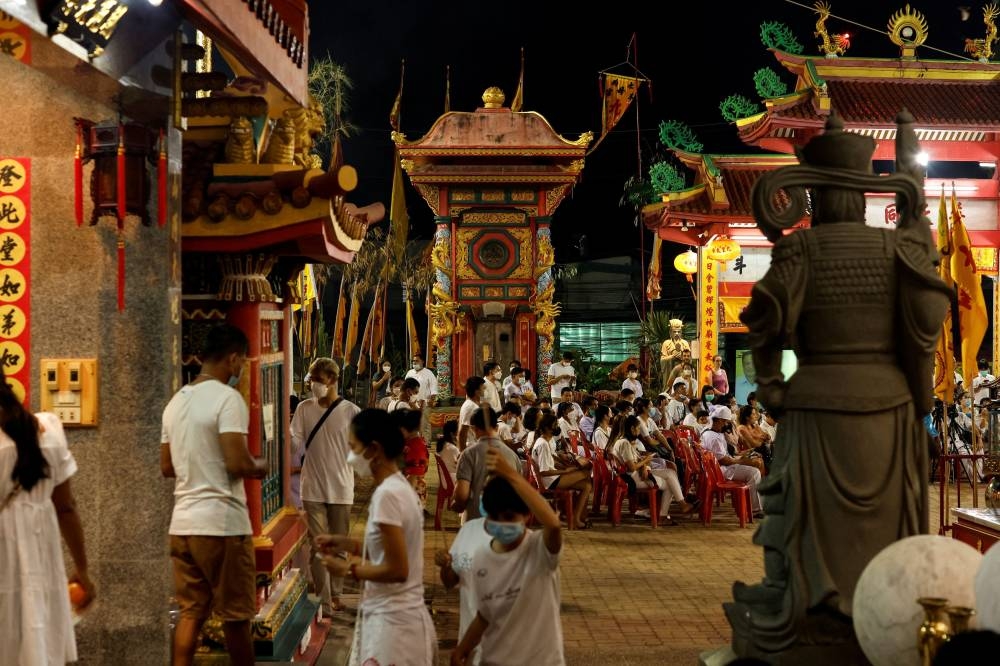 People flock the Jui Tui shrine during the annual vegetarian festival in Phuket September 27, 2022.  — Reuters pic