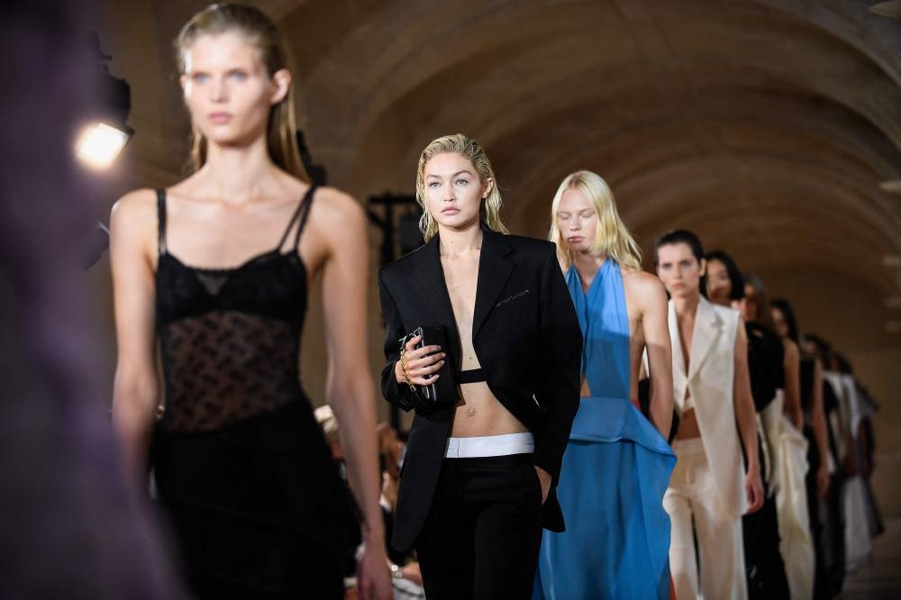 US model Gigi Hadid presents a creation for the Victoria Beckham Spring-Summer 2023 fashion show during the Paris Womenswear Fashion Week, in Paris, on September 30, 2022. ― AFP pic