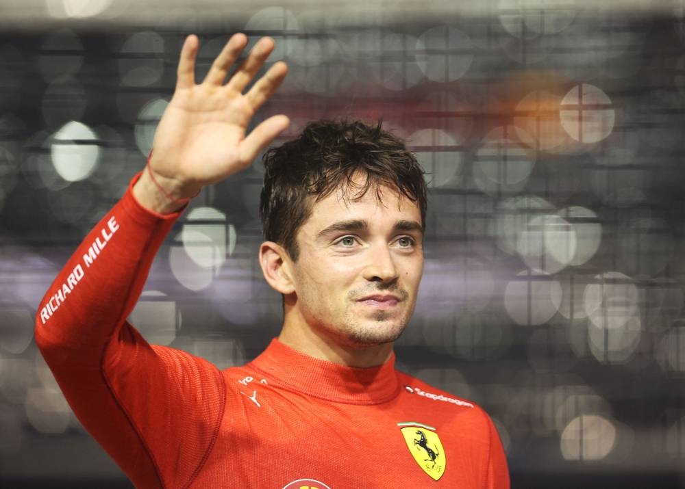 Ferrari’s Charles Leclerc celebrates after qualifying in pole position during the Singapore Grand Prix at the Marina Bay Street Circuit in Singapore, October 1, 2022. ― Reuters pic