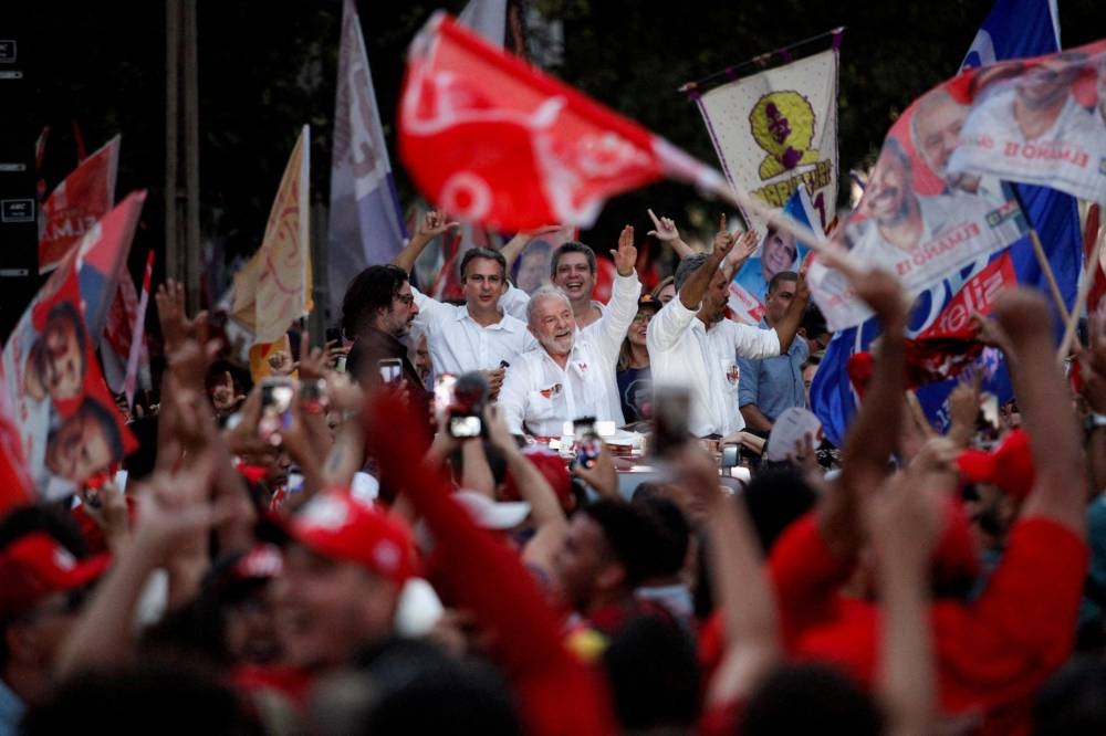 Brazil’s former President and candidate for presidential election Luiz Inacio Lula da Silva greets supporters in Fortaleza, Brazil, September 30, 2022. ― AFP pic