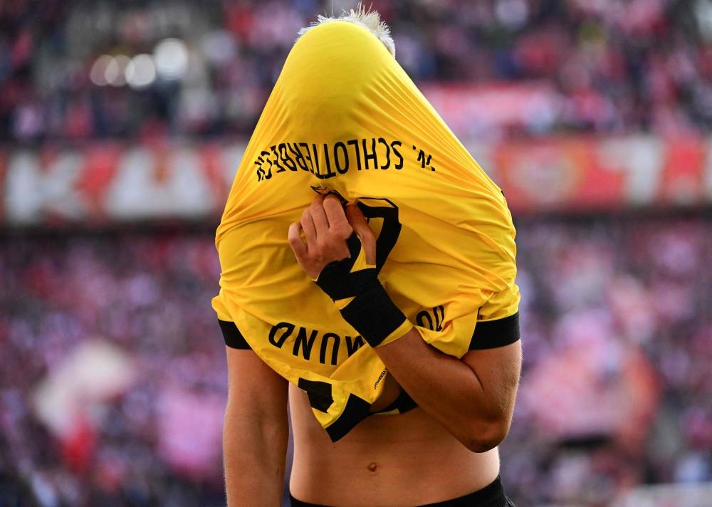 Dortmund's German defender Nico Schlotterbeck reacts after the German first division Bundesliga football match between FC Cologne and Borussia Dortmund in Cologne on October 1, 2022. — AFP pic