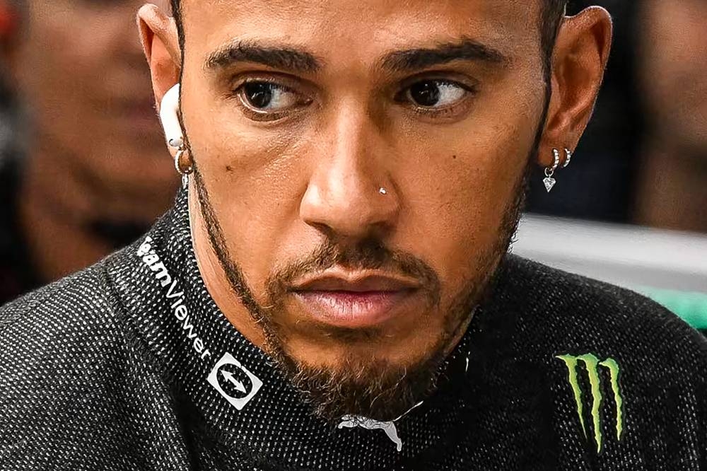 Mercedes' British driver Lewis Hamilton looks on before a practice session for the Formula One Singapore Grand Prix night race at the Marina Bay Street Circuit in Singapore on October 1, 2022. — AFP pic