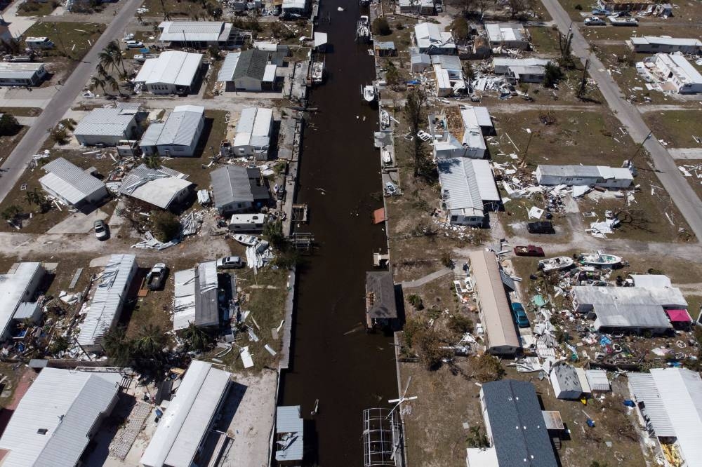 Destroyed homes, vehicles and boats are seen after Hurricane Ian caused widespread destruction in Pine Island, Florida October 2, 2022. — Reuters pic
