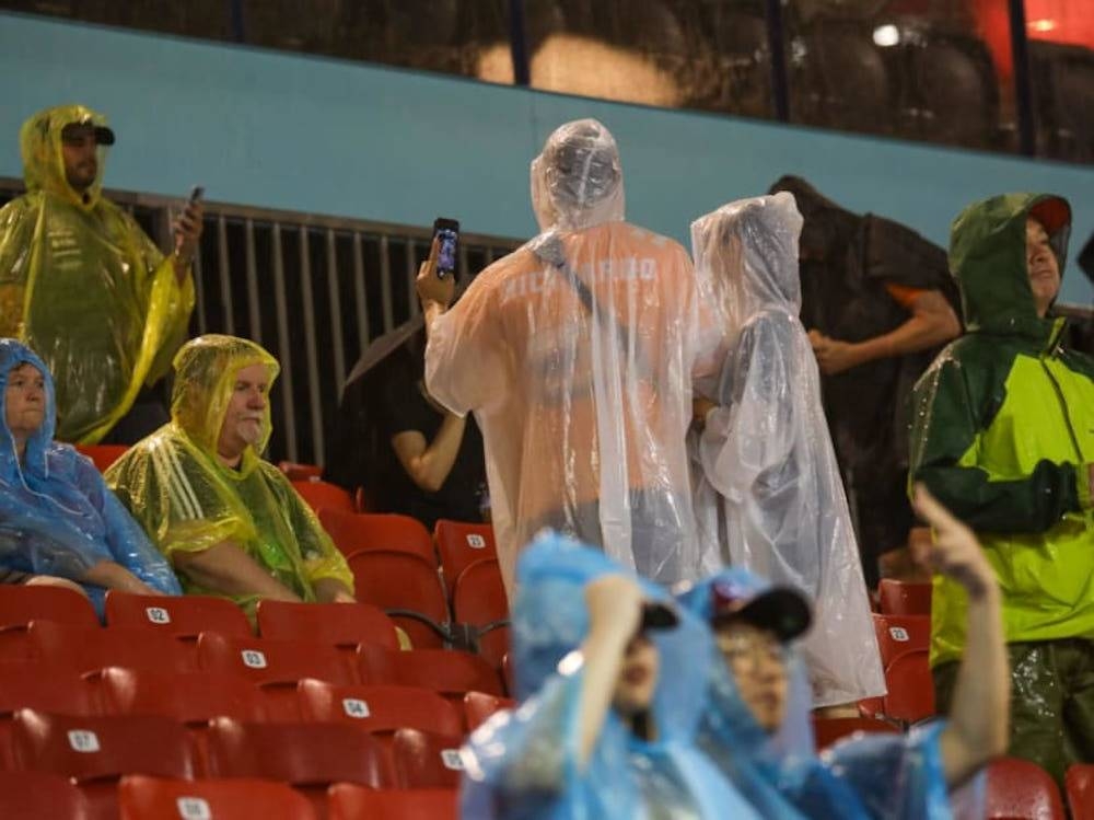 Spectators waiting for the Singapore Grand Prix to start on October 2, 2022, after it was delayed by an hour due to a storm. — TODAY pic