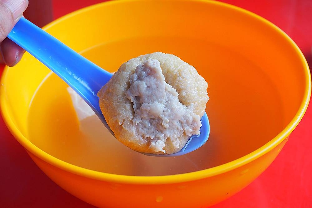 The stuffed tofu puff is a generous bite and served with a clear soup.