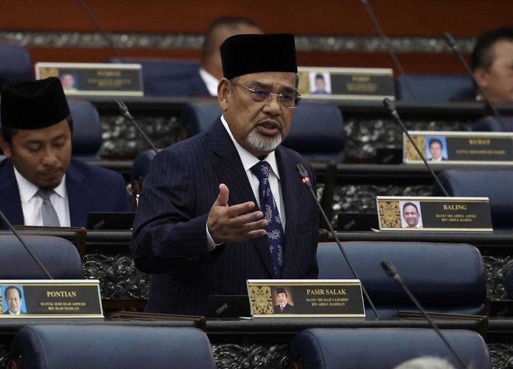 Pasir Salak MP Datuk Seri Tajuddin Abdul Rahman speaks during the question-and-answer session in Dewan Rakyat, Kuala Lumpur October 3, 2022. — Bernama pic