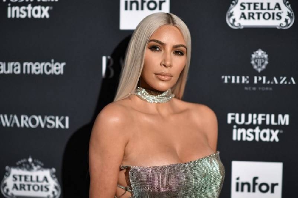 The SEC said in a statement that Kim Kardashian failed to disclose that she was paid US$250,000 to publish the post about EMAX tokens, the crypto asset security being offered by EthereumMax on her Instagram account. — AFP pic