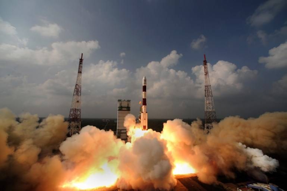 This handout photograph released by the Indian Space Research Organisation (ISRO) on November 6, 2013, shows the PSLV-C25 rocket carrying the Mars Orbiter Spacecraft blasting off from the launchpad at Sriharikota on November 5, 2013. — AFP pic