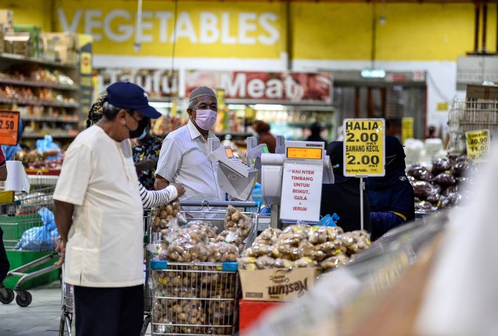Shoppers browse for goods at a supermarket in Kuala Lumpur, June 26, 2022. — Bernama pic