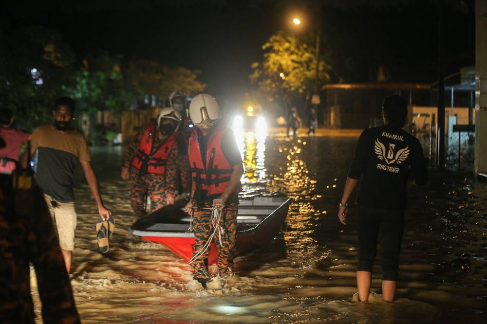 File picture of flash floods at Taman Kledang Sungai Siput, Perak, March 14, 2022. — Picture by Farhan Najib