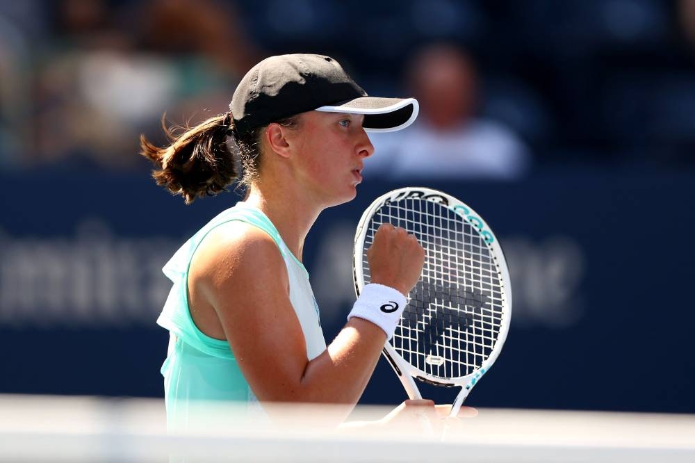 Swiatek will face either American Caty McNally or Czech home hope Karolina Muchova in the quarter-finals. — AFP pic