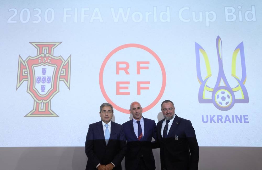 Portuguese Football Federation president Fernando Gomes, Spanish football Federation president Luis Rubiales and Ukrainian Association of Football president Andriy Pavelko pose during a press conference at Uefa's headquarters in Nyon October 5, 2022. — Reuters pic